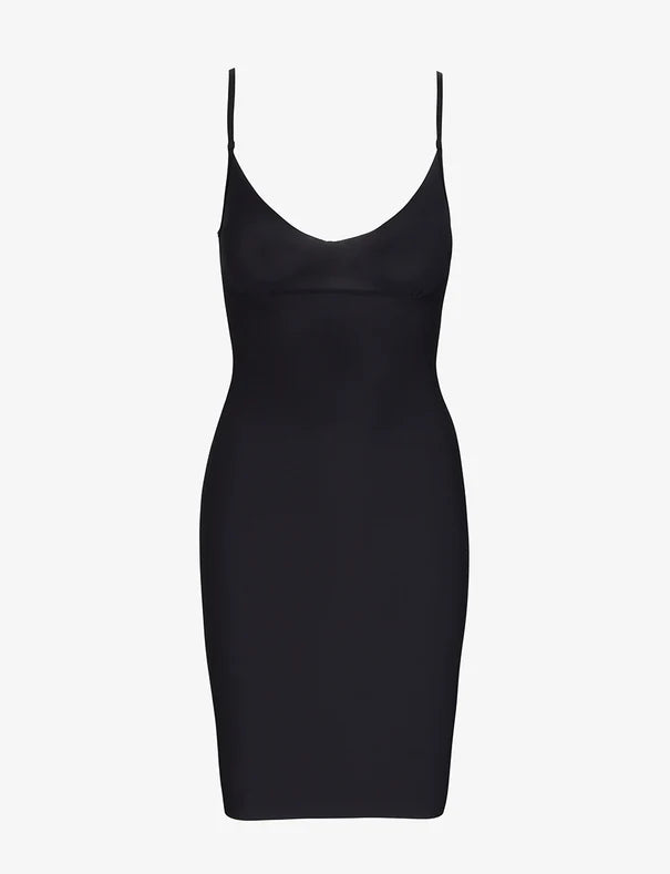 Black slip dress on a white background
