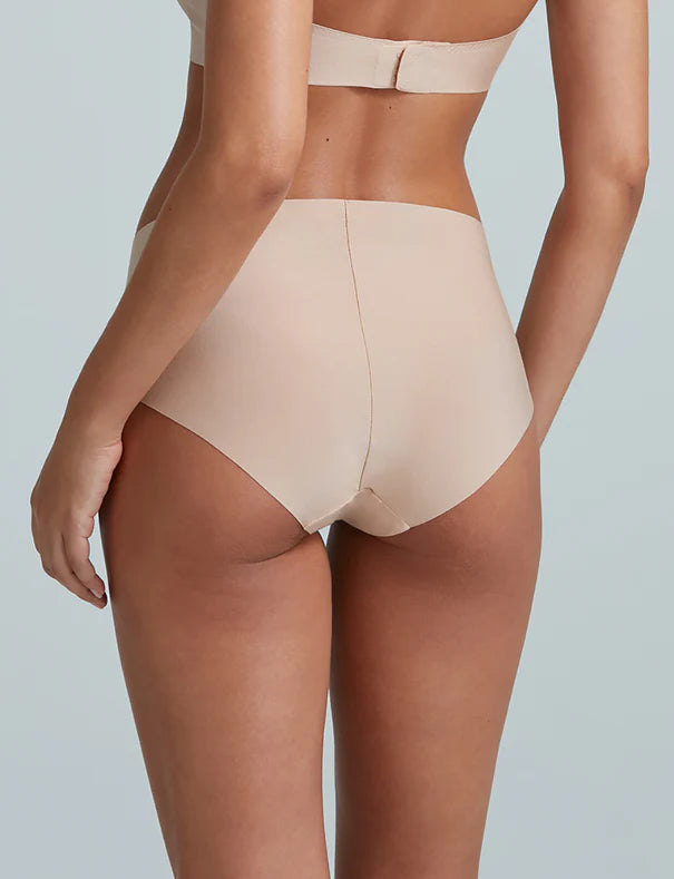 Beige bikini set on a plain background
