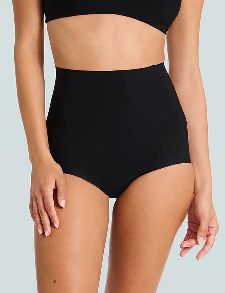 Person wearing black high-waisted bikini bottoms on a light gray background