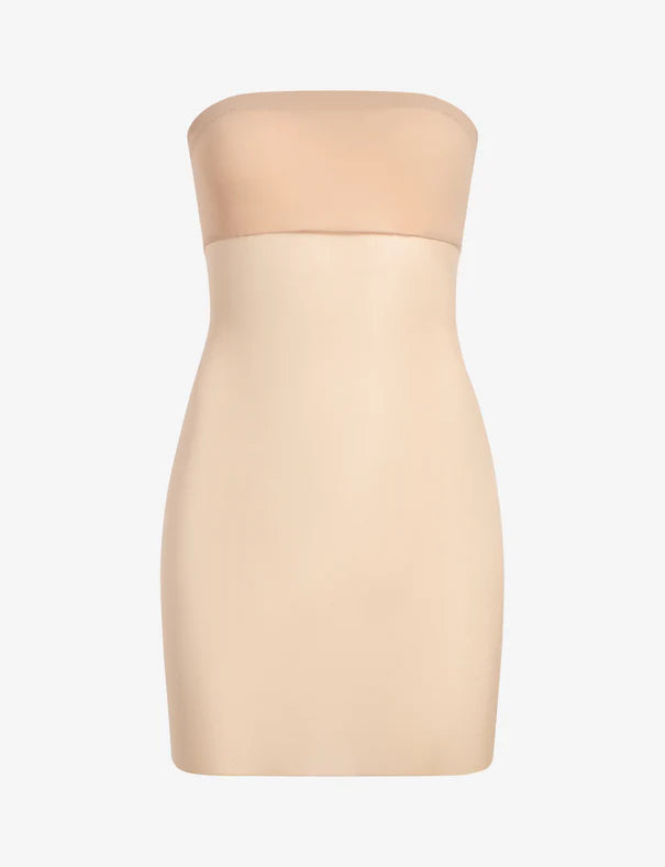 Beige strapless dress on a white background