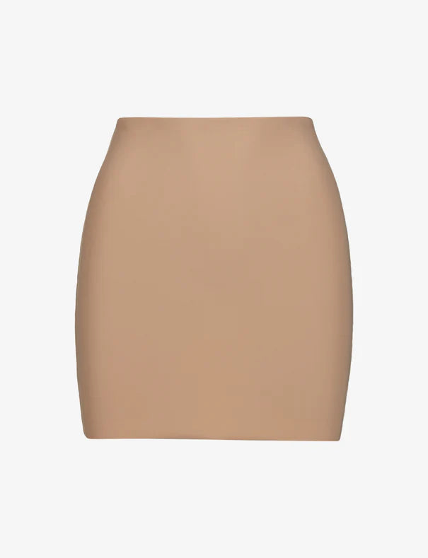 Beige mini skirt on a white background