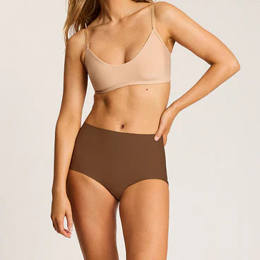 Woman in soft brown underwear
